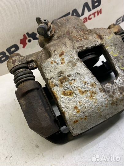 Суппорт тормозной передний правый Chevrolet