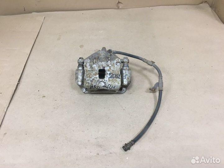 Суппорт тормозной передний правый Kia Magentis MG