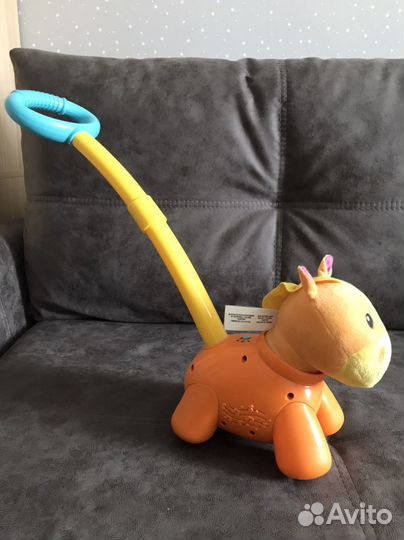 Игрушка каталка с ручкой