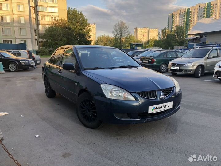 Mitsubishi Lancer 1.6 МТ, 2004, 261 000 км