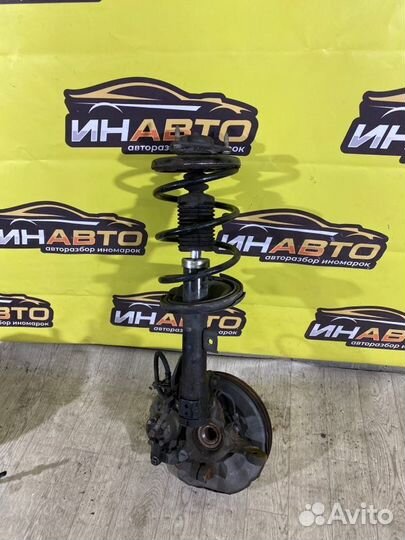 Стойка подвески передняя правая Mitsubishi Lancer