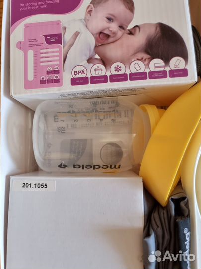 Молокоотсос medela электрический