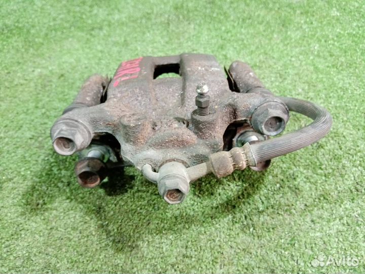 Суппорт тормозной задний левый Nissan X-Trail NT31