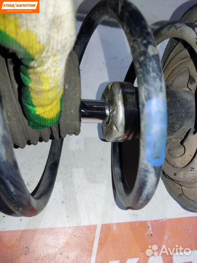 Стойка амортизатора передняя левая Toyota Corolla