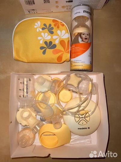 Молокоотсос электрический Medela swing maxi