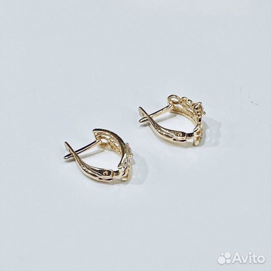 Золотые серьги с камнем