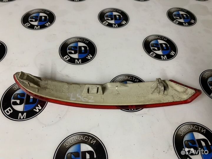 Отражатель бампера правый BMW F07