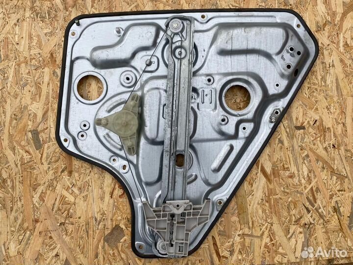 Стеклоподъемник электрический задний левый Kia