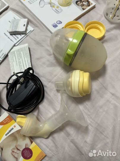 Молокоотсос medela swing электрический