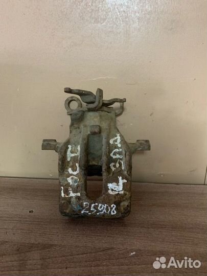 Суппорт тормозной задний левый Focus I