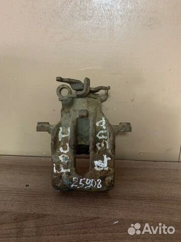 Суппорт тормозной задний левый Focus I