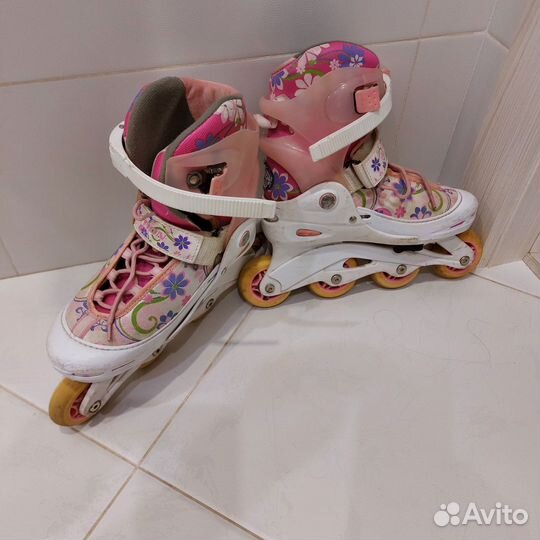 Роликовые коньки