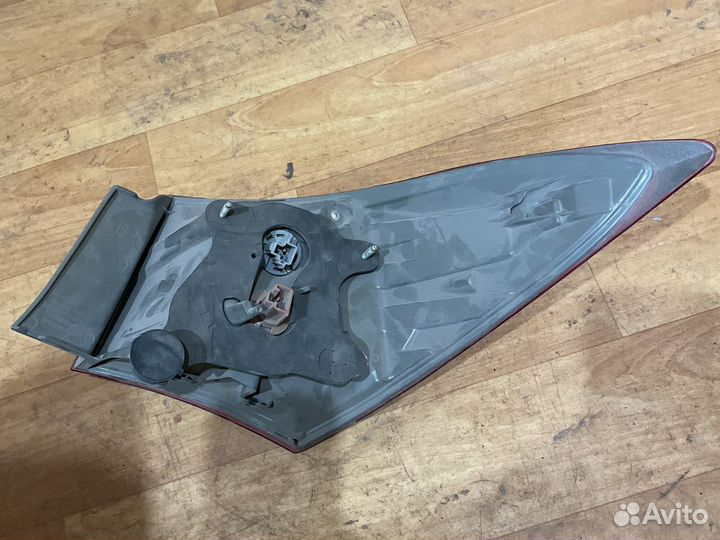 Фонарь левый тойота корола