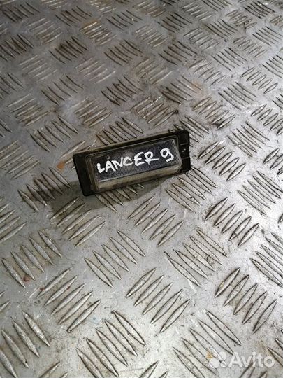 Фонарь подсветки номера задний правый Mitsubishi