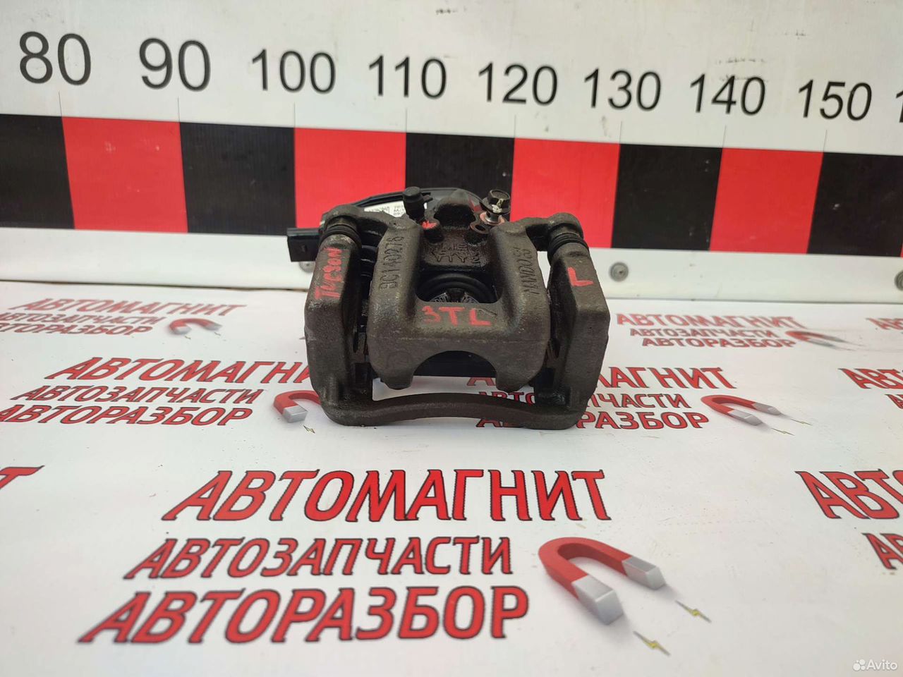 Супорт тормозной задний левый Туксон 3 TL