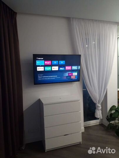 Установка телевизора на стену, настройка функций