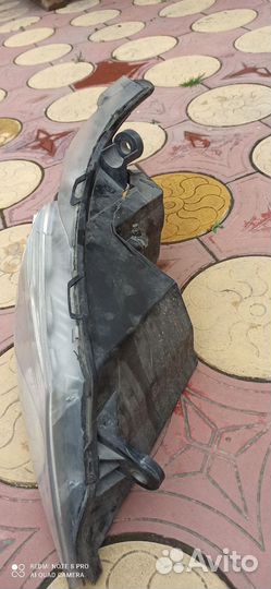 Битая фара на фольцваген роутан, пасажирская стор