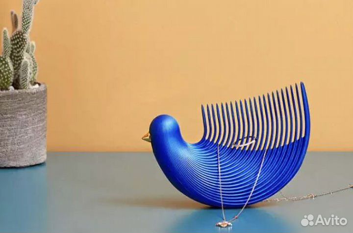 Гребень - птичка для массажа головы