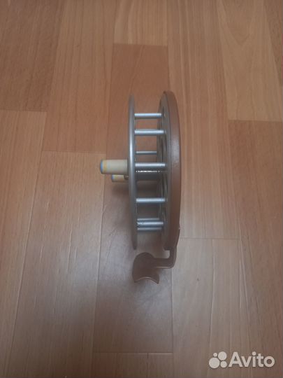 Катушка рыболовная инерционная