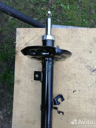 Стойка амортизатора Nissan X-Trail T32