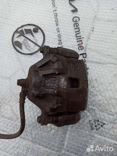 Суппорт передний правый kia sportage 2