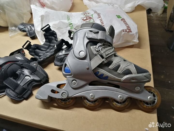 Роликовые коньки