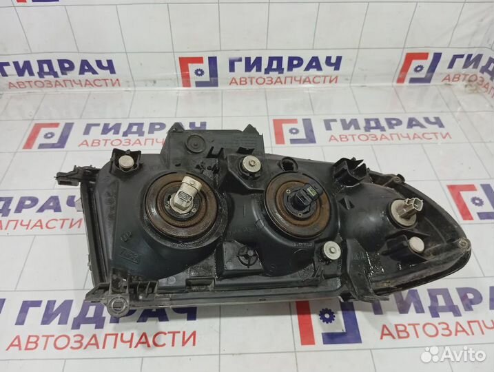 Фара левая Toyota Land Cruiser (J100) 81050-60040