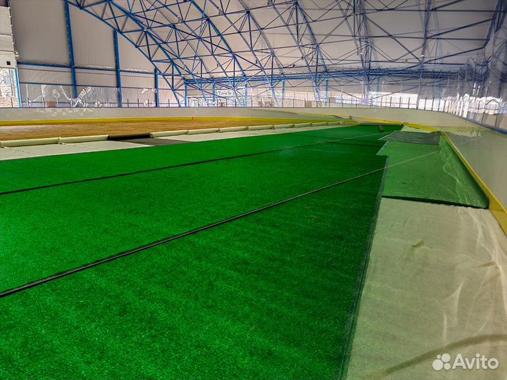 Укладка искусственной травы для футбольного поля