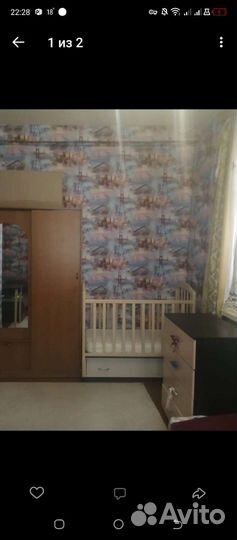 Детская кроватка с маятником и ящиком