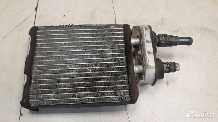 Радиатор отопителя Mazda 323