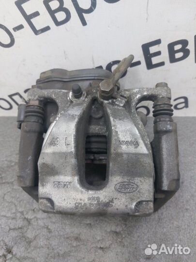 Суппорт с электроручником задний левый Land Rover