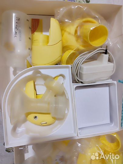 Молокоотсос medela электрический