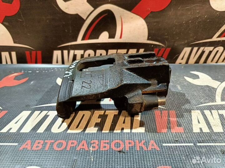 Суппорт тормозной передний Ford Focus седан zetec