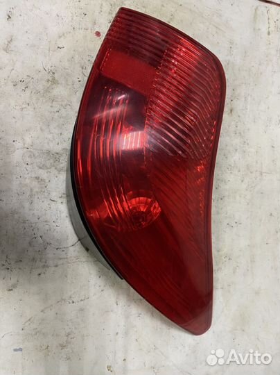 Фонарь задний левый Peugeot 308 универсал