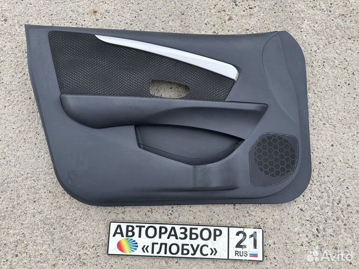 Обшивка двери передняя левая Nissan Almera G15