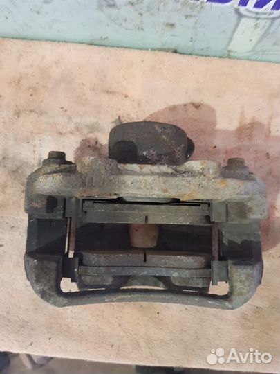 Суппорт передний правый Daewoo Nexia