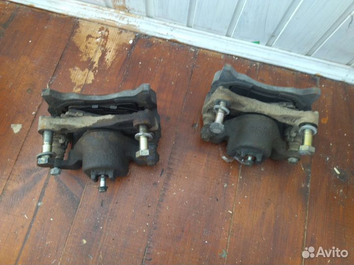 Суппорта передние Nissan Teana l33