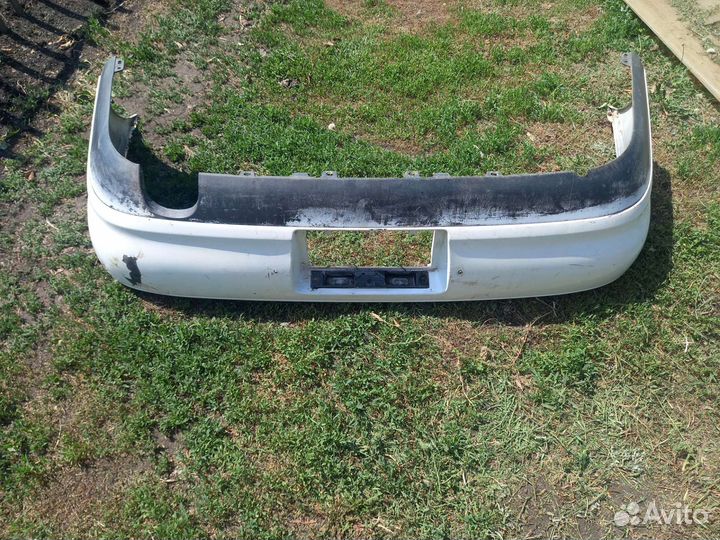 Бампер задний toyota carina e