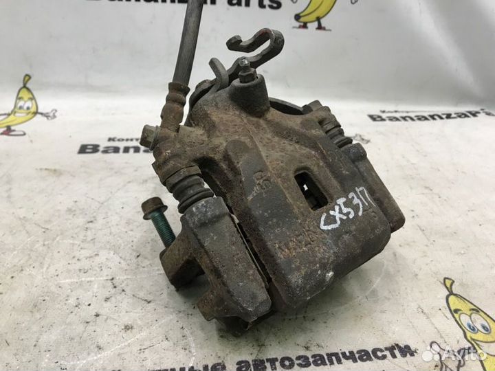 Суппорт тормозной задний правый Mazda Cx-5 KE