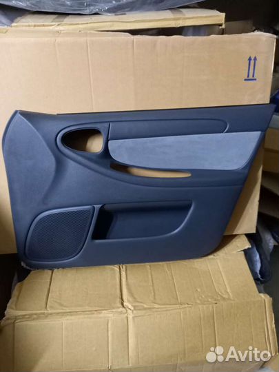 Обшивка двери передней правой Chevrolet Lanos