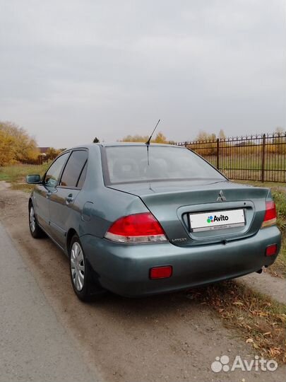 Mitsubishi Lancer 1.6 МТ, 2006, 245 000 км