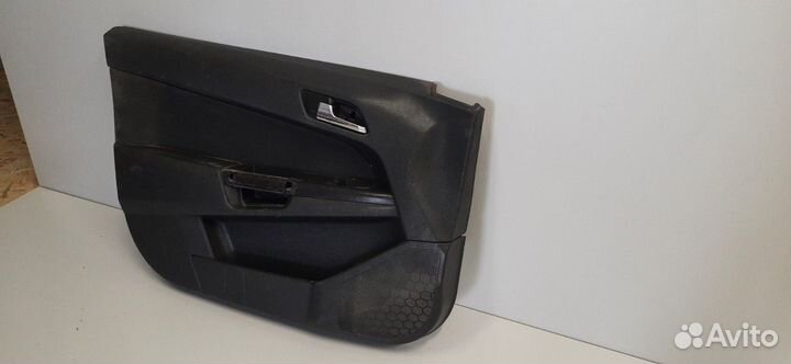 Обшивка двери передней левой Opel Astra H / Family