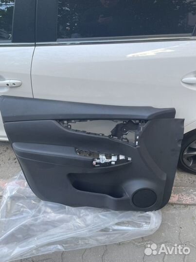 Обшивка водительской двери X-Trail