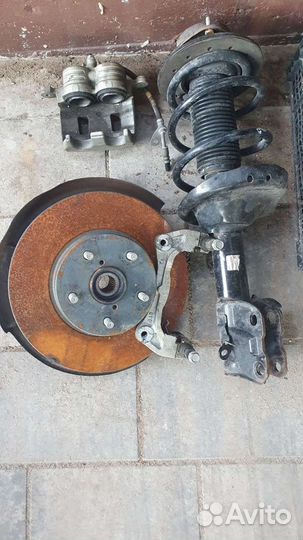 Кулак передний левый subaru legacy