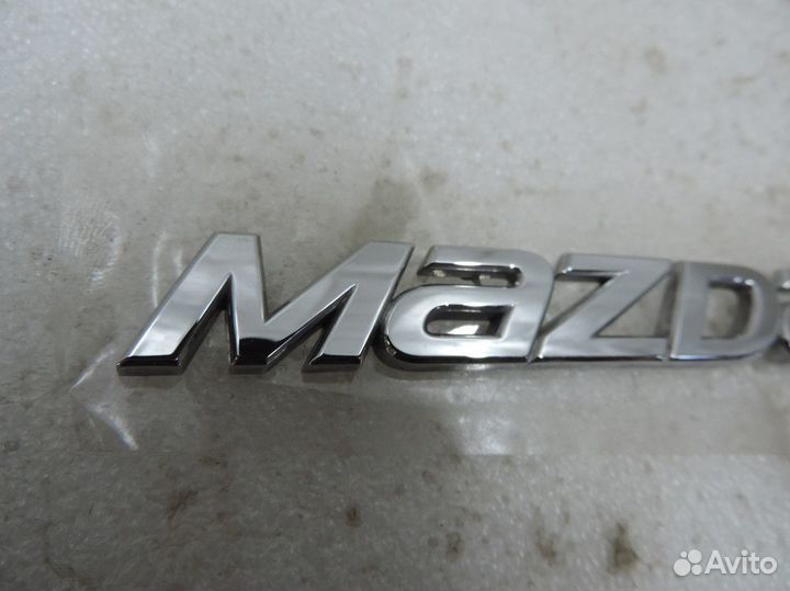 Эмблема багажника Mazda 6 2012 - 2016