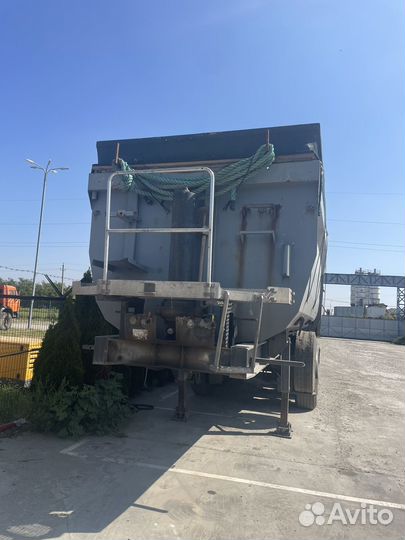 Полуприцеп самосвальный Grunwald 9539-0000070-10, 2011