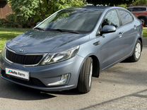 Kia Rio 1.6 AT, 2013, 128 000 км, с пробегом, цена 1 055 000 руб.