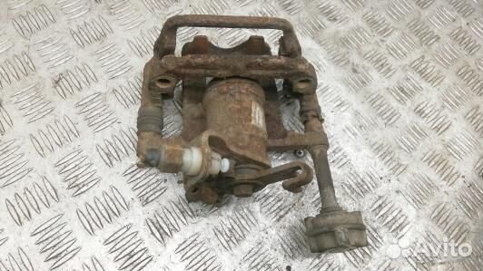 Суппорт тормозной задний левый opel astra J (SEA04