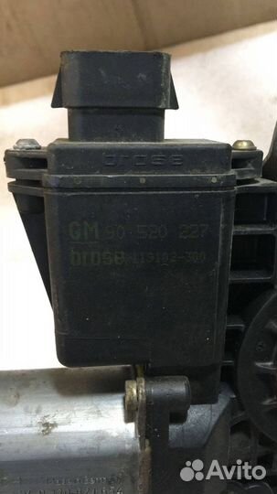 Мотор стеклоподъемника передний левой двери Opel