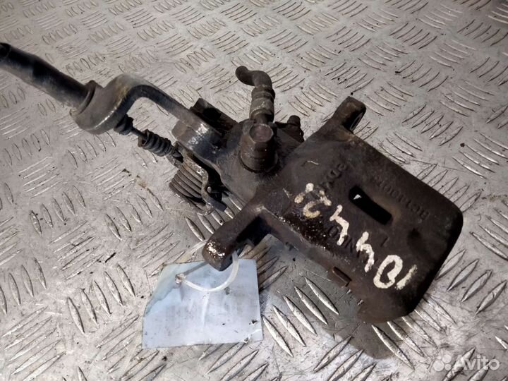 Суппорт задний левый Kia Cerato 03-09